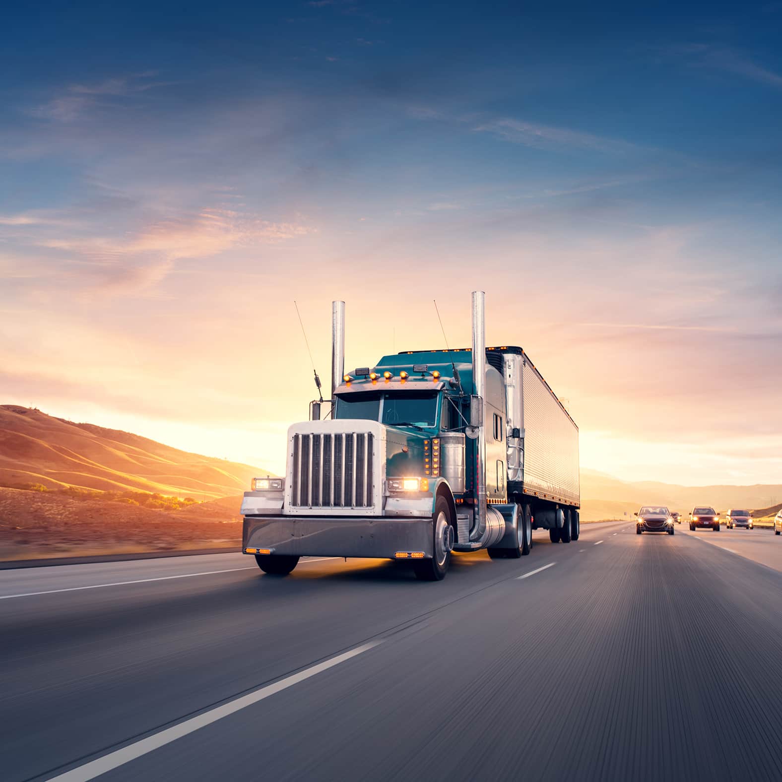 American style truck on freeway pulling load. Transportation the