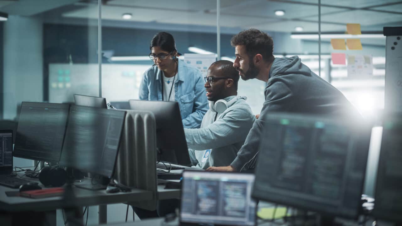 Diverse Group of Professionals Meeting in Modern Office: Brainst