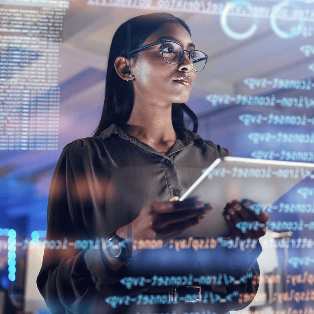 Businesswoman analyzing data on digital tablet with futuristic interface.
