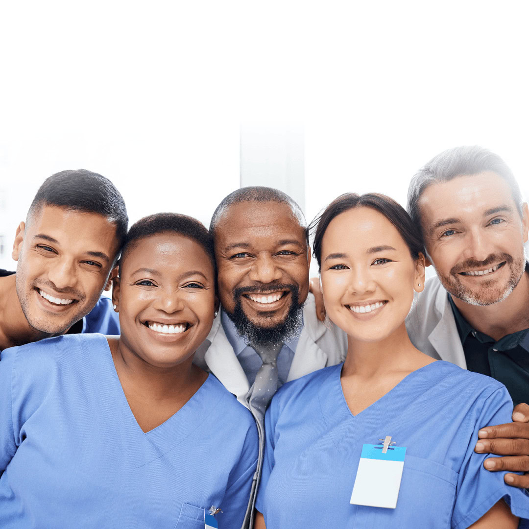 Diverse healthcare team smiling in medical scrubs and uniforms.